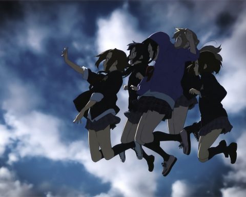 空に向けてジャンプするバンド「放課後ティータイム」のメンバー